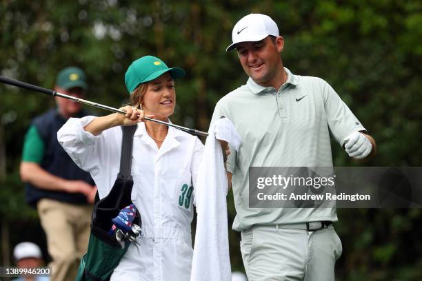 Scottie Scheffler of the United States and wife Meredith Scudder during the Par Three Contest prior to the Masters at Augusta National Golf Club on...