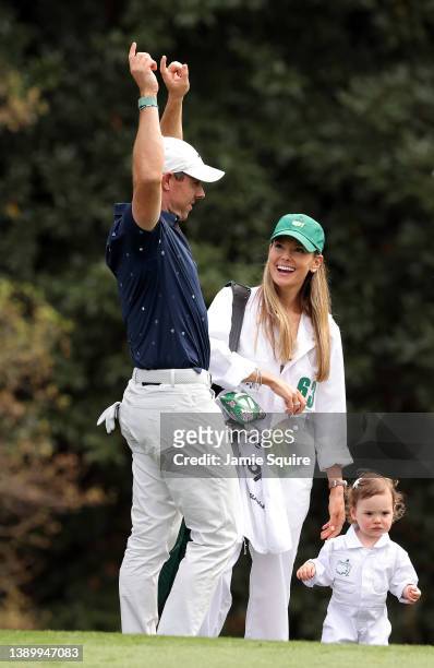 Rory McIlroy of Northern Ireland wife Erica Stoll and daughter Poppy McIlroy during the Par Three Contest prior to the Masters at Augusta National...