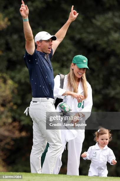 Rory McIlroy of Northern Ireland wife Erica Stoll and daughter Poppy McIlroy during the Par Three Contest prior to the Masters at Augusta National...