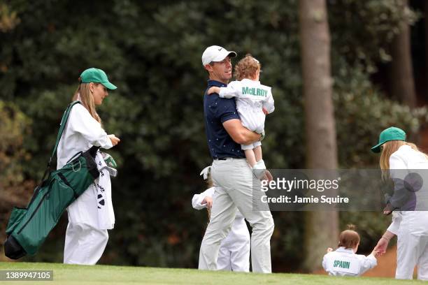 Rory McIlroy of Northern Ireland wife Erica Stoll and daughter Poppy McIlroy during the Par Three Contest prior to the Masters at Augusta National...