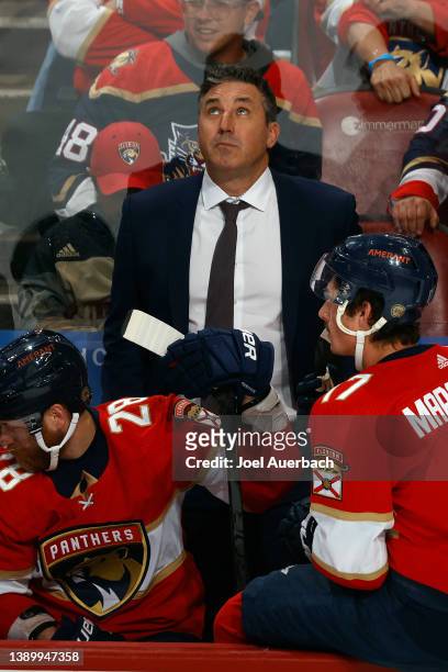 Florida Panthers Interim head coach Andrew Brunette of the Florida Panthers watches a replay during a break in action against the Toronto Maple Leafs...