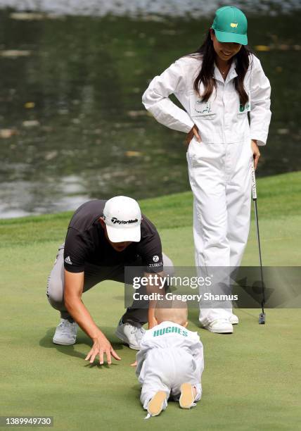 Collin Morikawa of the United States and Katherine Zhu during the Par Three Contest prior to the Masters at Augusta National Golf Club on April 06,...