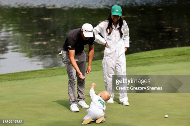 Collin Morikawa of the United States and Katherine Zhu during the Par Three Contest prior to the Masters at Augusta National Golf Club on April 06,...