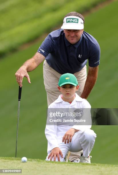Bubba Watson of the United States and son Caleb Watson during the Par Three Contest prior to the Masters at Augusta National Golf Club on April 06,...