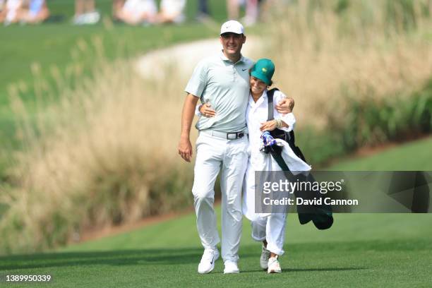 Scottie Scheffler of the United States and wife Meredith Scudder during the Par Three Contest prior to the Masters at Augusta National Golf Club on...
