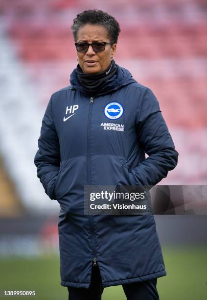 Brighton & Hove Albion manager Hope Powell during the warm up before the Barclays FA Women's Super League match between Manchester United Women and...