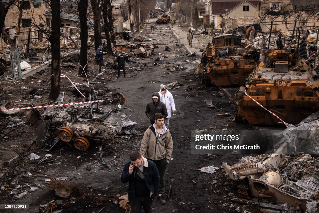 Russian Retreat From Bucha Reveals Scores Of Civilian Deaths