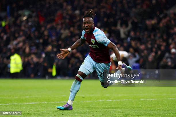 Maxwel Cornet of Burnley celebrates after scoring their team's third goal during the Premier League match between Burnley and Everton at Turf Moor on...