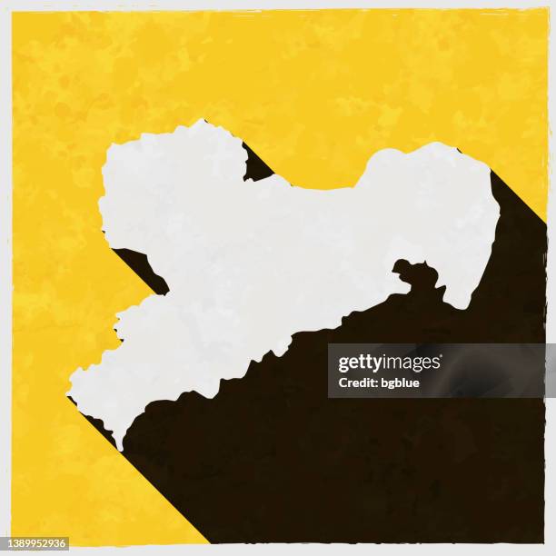 saxony map with long shadow on textured yellow background - saxony stock illustrations