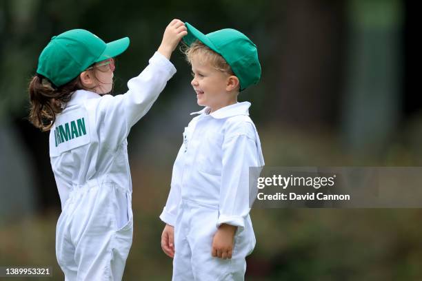 The children of Brian Harman of the United States and Hudson Swafford of the United States during the Par Three Contest prior to the Masters at...
