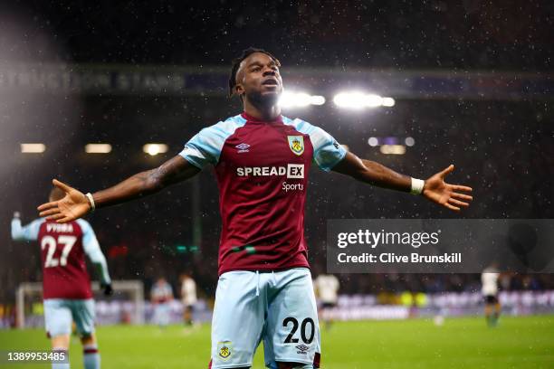 Maxwel Cornet of Burnley celebrates after scoring their team's third goal during the Premier League match between Burnley and Everton at Turf Moor on...