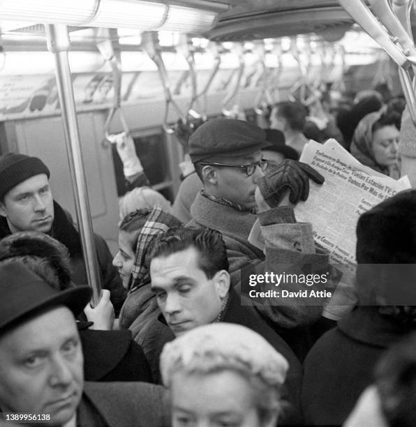 Passengers on the New York City subway in January 1959 in New York City, New York.