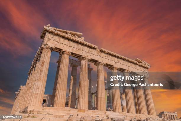 beautiful sunset clouds over the parthenon at the acropolis of athens, greece - athens democracy stock pictures, royalty-free photos & images