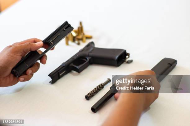 Simple Gun Assembly Gun Disassembly Photos and Premium High Res Pictures - Getty Images