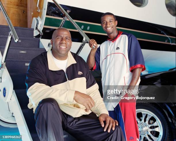 American former professional basketball player Magic Johnson and his son, Andre Johnson at Van Nuys airport in October, 2005 in Van Nuys, California.