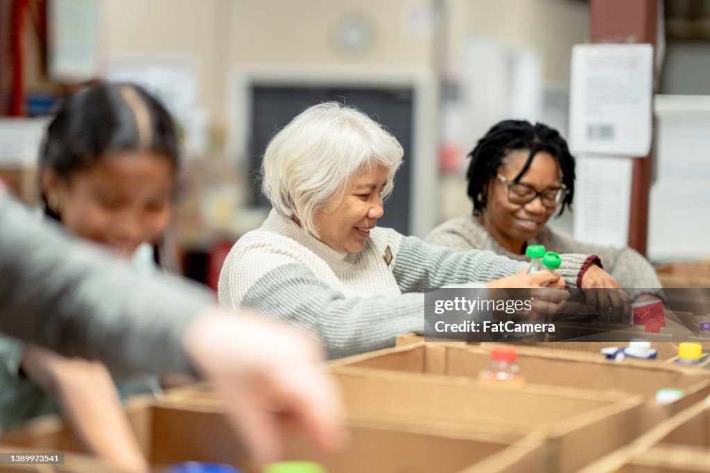 Volunteers Packing at a Local Food Bank