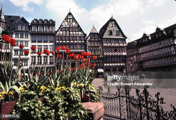Visitors and residents enjoy Frankfurt, Germany's main square, The Romerberg, in the city's Altstadt . The east side of the square is known as the...