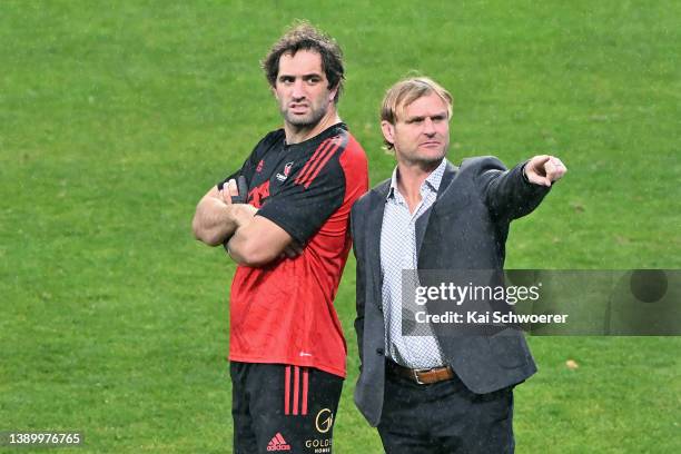 Samuel Whitelock and Head Coach Scott Robertson of the Crusaders look on prior to the round seven Super Rugby Pacific match between the Crusaders and...