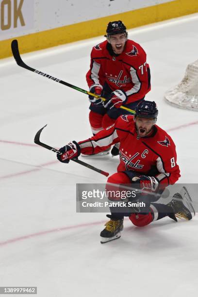 Alex Ovechkin of the Washington Capitals celebrates with teammates after scoring a goal against the Tampa Bay Lightning during the first period at...