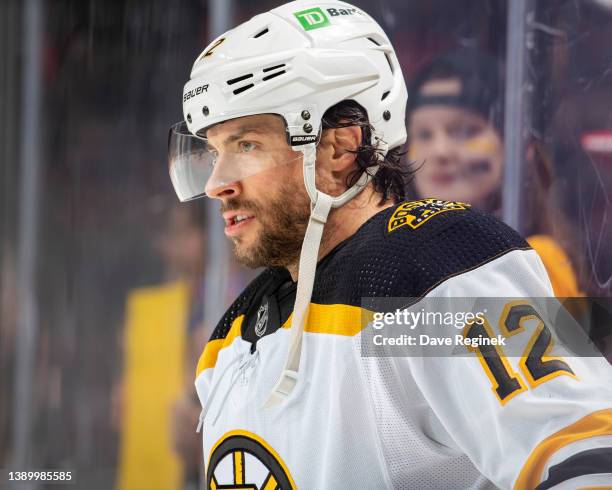 Craig Smith of the Boston Bruins skates around in warm ups before an NHL game against the Detroit Red Wings at Little Caesars Arena on April 5, 2022...