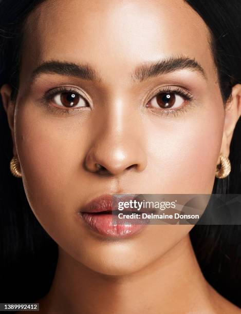 studio shot of an attractive young woman - stare models stock pictures, royalty-free photos & images