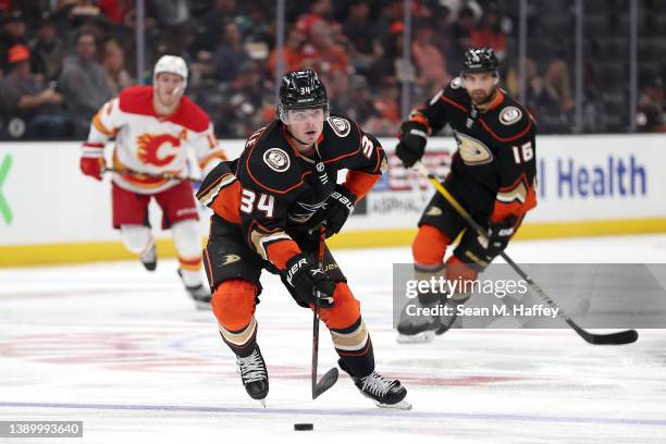 Jamie Drysdale of the Anaheim Ducks skates with the puck during the first period of a game against the Calgary Flames at Honda Center on April 06,...