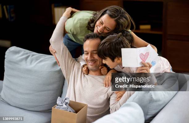 happy father opening his gift for father's day - open day 7 stock pictures, royalty-free photos & images