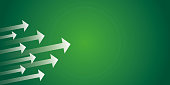 White arrow group with light on green background. Business target or goal success, team, teamwork.