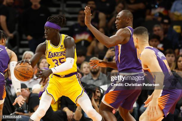 Wenyen Gabriel of the Los Angeles Lakers passes the ball during the second half of the NBA game against the Phoenix Suns at Footprint Center on April...