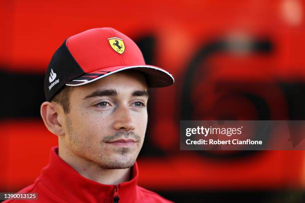 Charles Leclerc of Monaco and Ferrari looks on in the Paddock during previews ahead of the F1 Grand Prix of Australia at Melbourne Grand Prix Circuit...