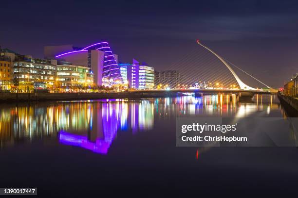 samuel beckett bridge, river liffey, dublin, ireland - convention centre dublin stock pictures, royalty-free photos & images