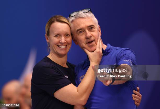 Melanie Marshall, Coach of Loughborough NC with Patrick Miley, Coach of University of Aberdeen looks on during day two of the British Swimming...