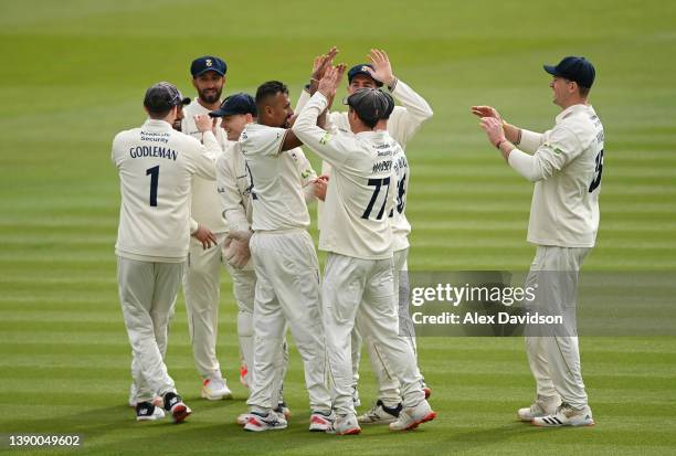 Suranga Lakmal of Derbyshire celebrates taking the wicket of Mark Stoneman of Middlesex with teammates during Day One of the LV= Insurance County...