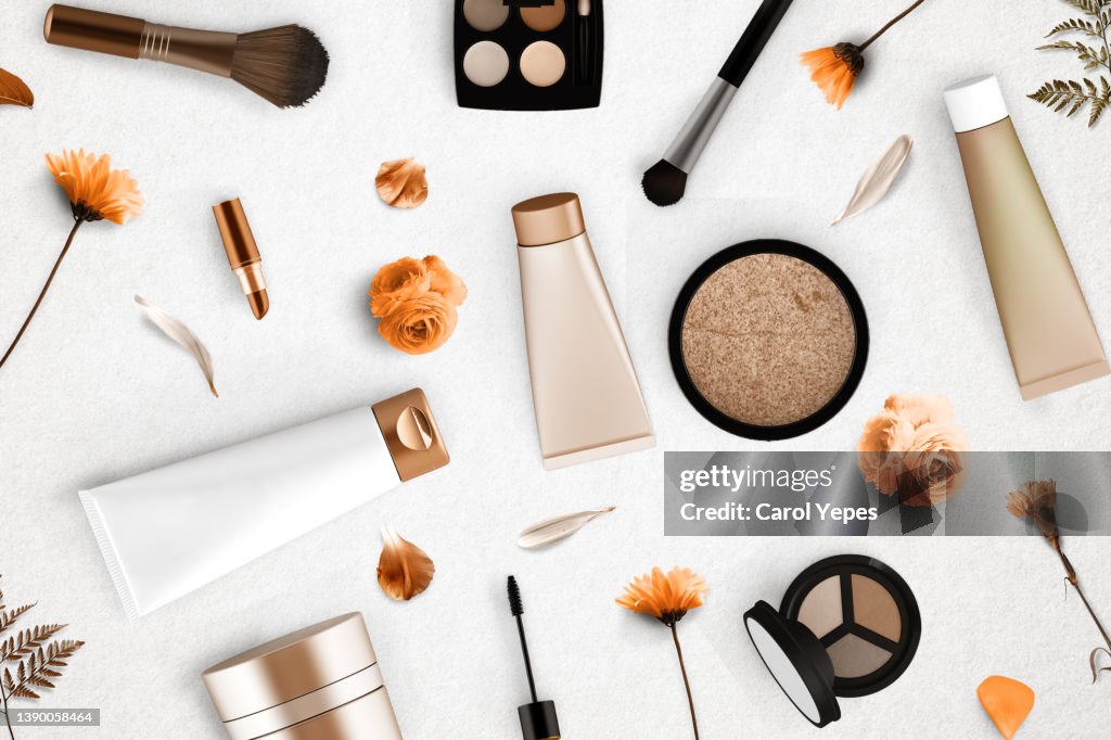 Various makeup products and cosmetics in white background.Top view-Spring items