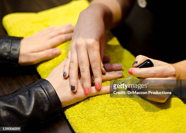 painted nails - black nail polish stock pictures, royalty-free photos & images