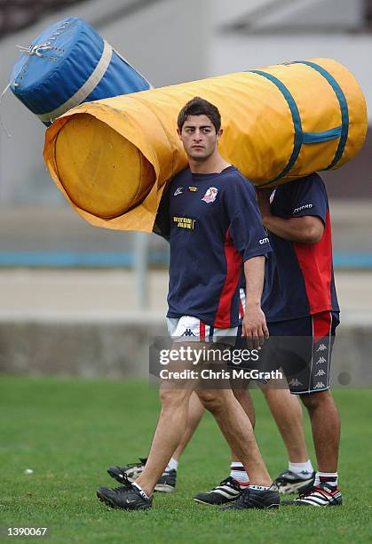 Anthony Minichiello carries tackling bags during the Sydney Roosters training session held at Wentworth Park, Sydney, Australia on September 17, 2002.