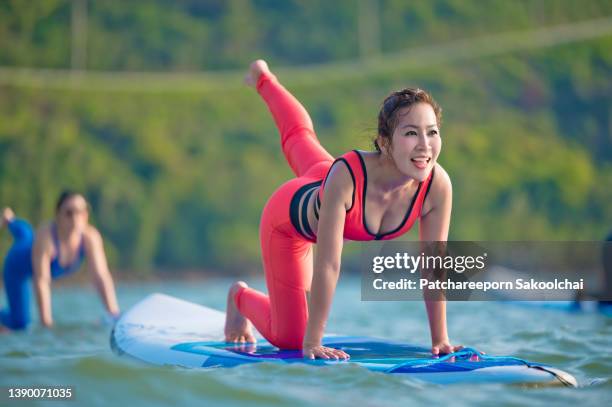 paddle stable mind - mature paddleboard stock pictures, royalty-free photos & images