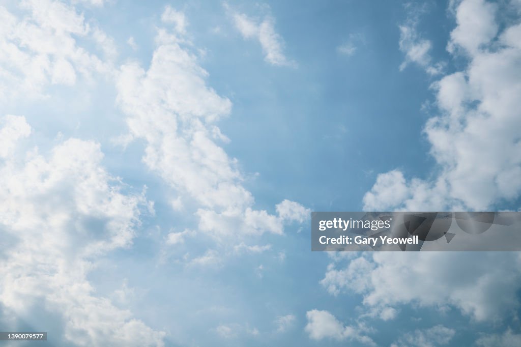 Fluffy clouds and blue sky