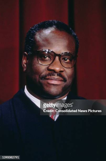American lawyer Clarence Thomas, Associate Justice Of The US Supreme Court, attends a portrait session for Justices of the United States Supreme...