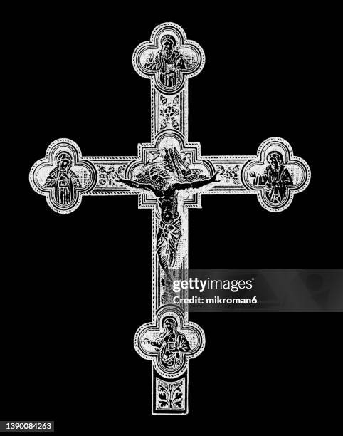 old engraved illustration of beautifully carved cross - crucifixion stock-fotos und bilder
