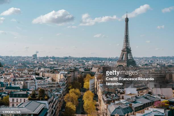 eiffel tower and the buildings of paris, high point of view. champs elysees, france, europe - paris stock-fotos und bilder