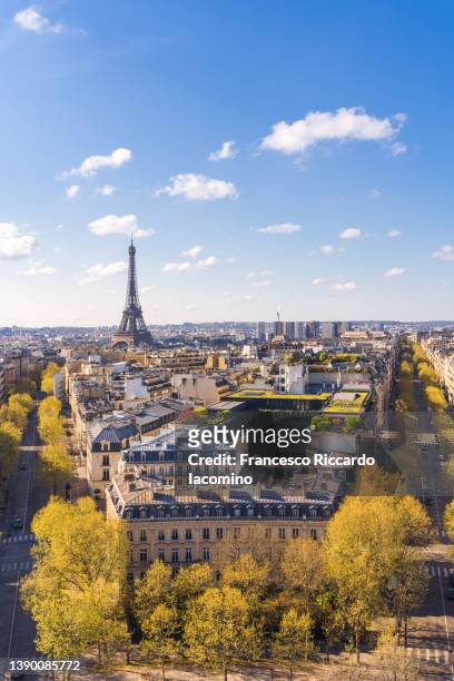 eiffel tower and the buildings of paris, high point of view. champs elysees, france, europe - arc de triomphe aerial view stock-fotos und bilder