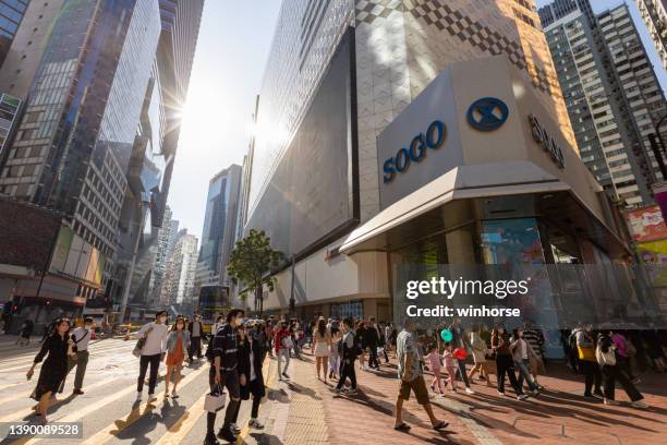 causeway bay in hong kong - sogo stock pictures, royalty-free photos & images