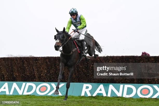 Harry Cobden on Clan Des Obeaux clear the last to win the Betway Bowl Chase race during Aintree Races at Aintree Racecourse on April 07, 2022 in...