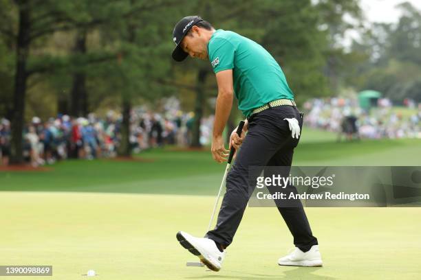 Kevin Na follows his ball in for par on the first green during the first round of the Masters at Augusta National Golf Club on April 07, 2022 in...