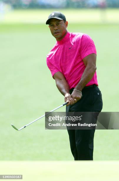 Tiger Woods follows his shot on the first hole during the first round of the Masters at Augusta National Golf Club on April 07, 2022 in Augusta,...