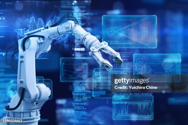 robot arm and futuristic graphical user interface screen - shopping online blue stock pictures, royalty-free photos & images