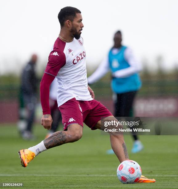 Douglas Luiz of Aston Villa in action during a training session at Bodymoor Heath training ground on April 07, 2022 in Birmingham, England.