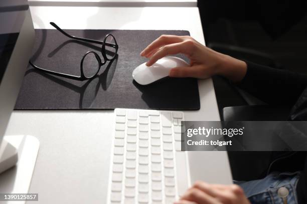 woman using keyboard with copy space. - hitting enter stock pictures, royalty-free photos & images