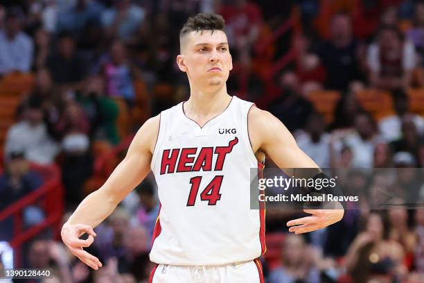 Tyler Herro of the Miami Heat celebrates a three pointer against the Charlotte Hornets during the second half at FTX Arena on April 05, 2022 in...